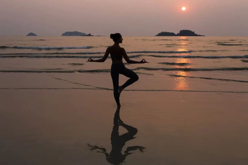 A woman doing yoga in Seminyak beach